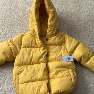 Old Navy yellow puffer coat. New with tags. Size 18-24 months.